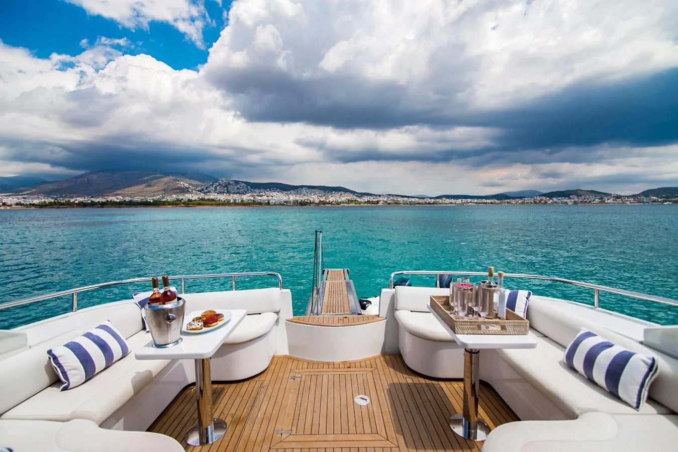 The aft deck offers a luxurious seating area with stunning views of the surrounding waters. aboard AXION Yacht for Sale