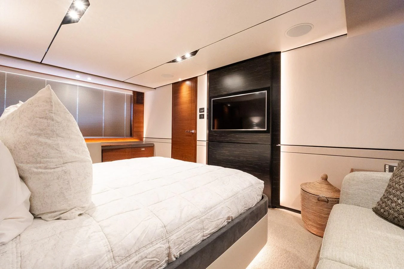 The stateroom offers a luxurious and comfortable sleeping area with modern amenities. aboard NAUTI NATALIE Yacht for Sale