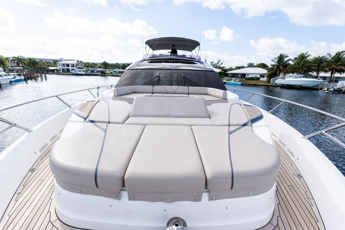 The yacht's foredeck features spacious sun pads for ultimate relaxation. aboard NAUTI NATALIE Yacht for Sale