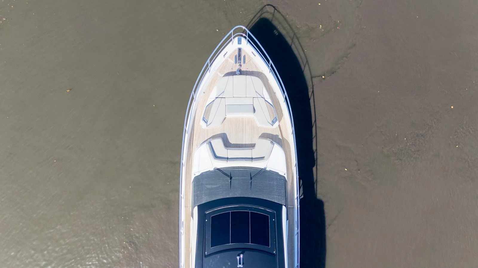 Aerial view of the yacht's bow showcasing its sleek design and spacious deck area. aboard NAUTI NATALIE Yacht for Sale