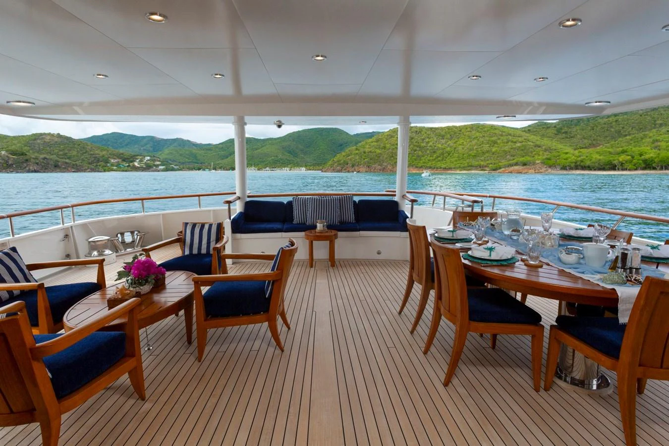The aft deck offers a spacious and inviting area for alfresco dining and relaxation with stunning views of the surrounding waters. aboard CONSTANCE Yacht for Sale