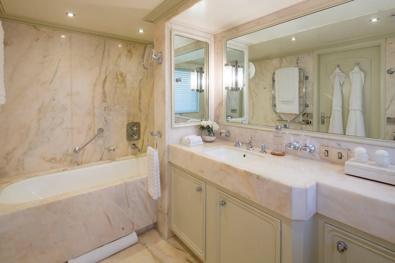 The yacht's bathroom features luxurious marble finishes and elegant fixtures. aboard CONSTANCE Yacht for Sale