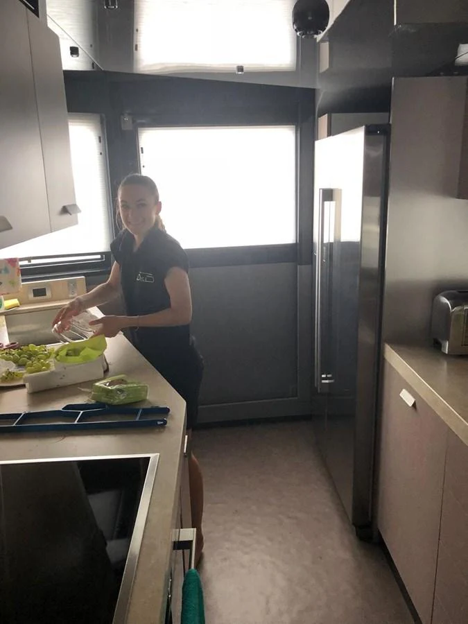 The galley features modern appliances and ample counter space, creating a functional and stylish environment for meal preparation. aboard D&D Yacht for Sale