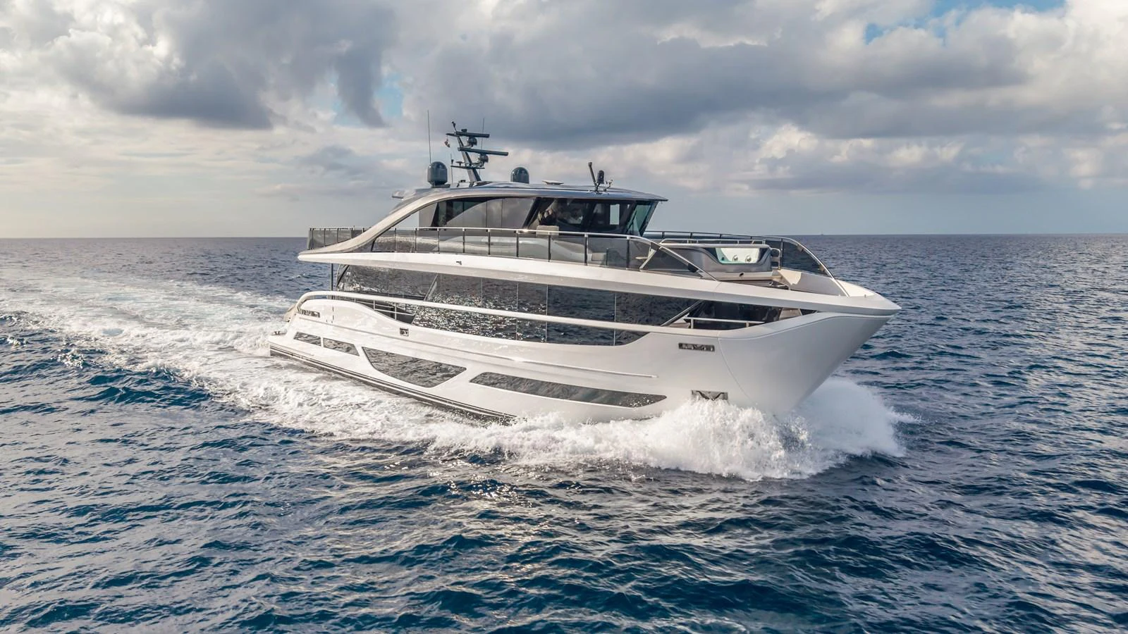 a white yacht in the water aboard GEMINI Yacht for Sale