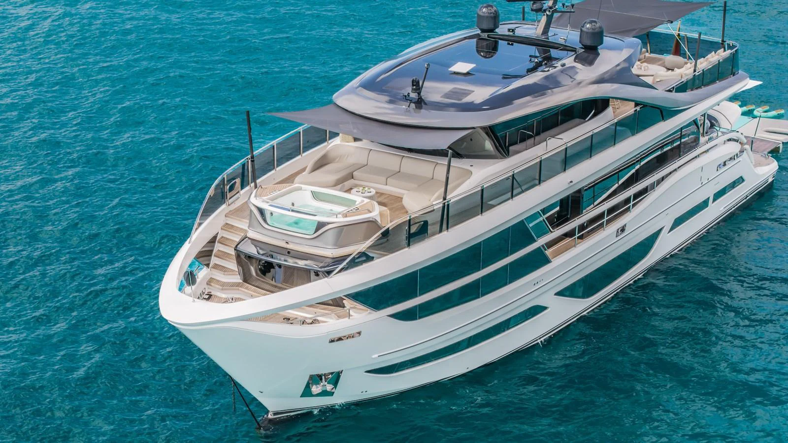 a white boat on the water aboard GEMINI Yacht for Sale