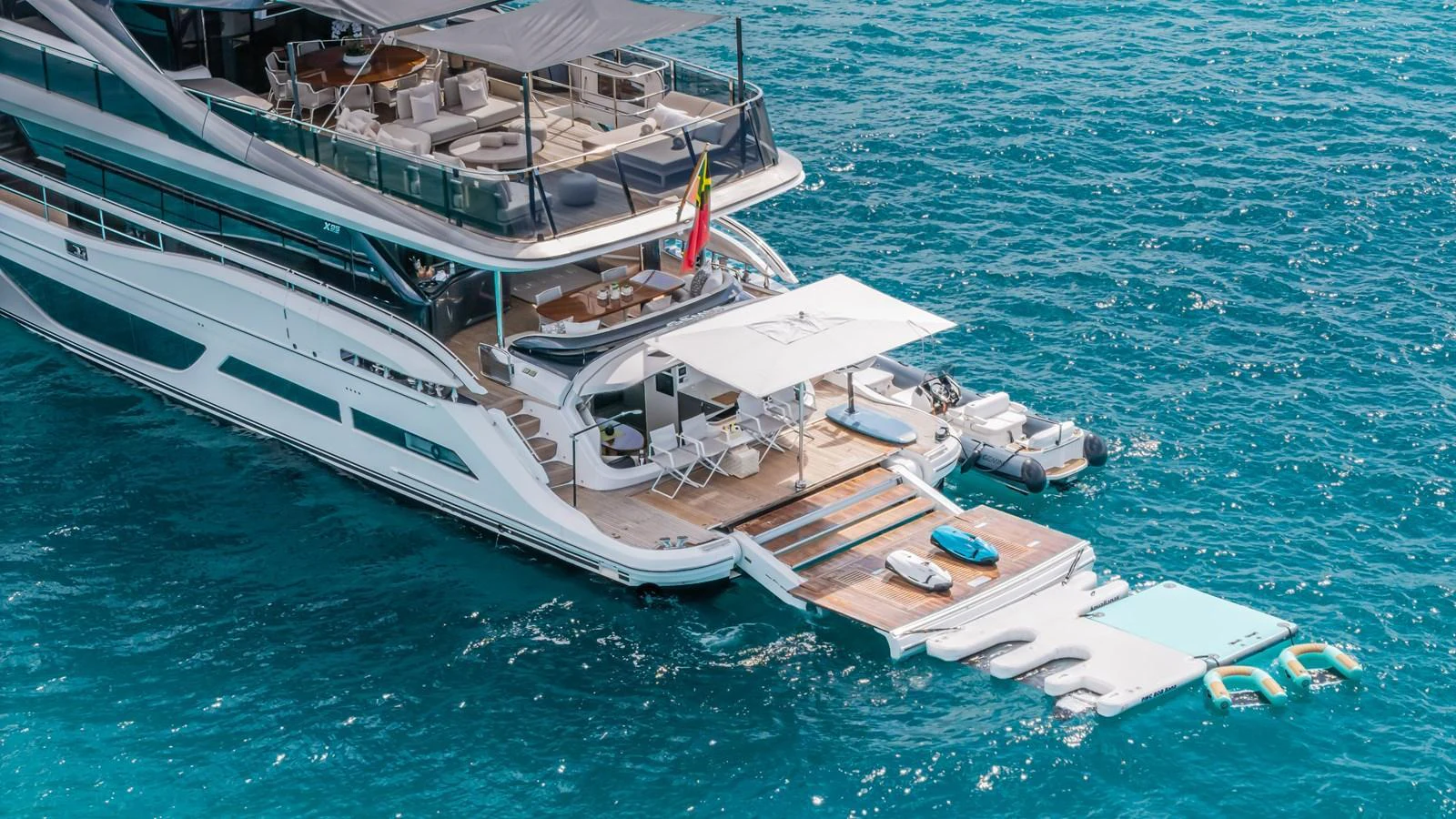 a large ship in the water aboard GEMINI Yacht for Sale