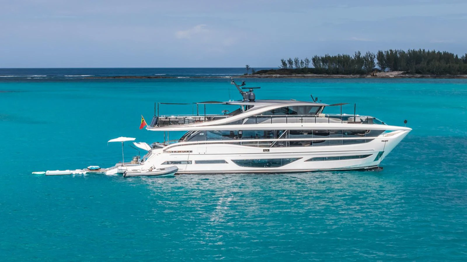 a white yacht in the water aboard GEMINI Yacht for Sale