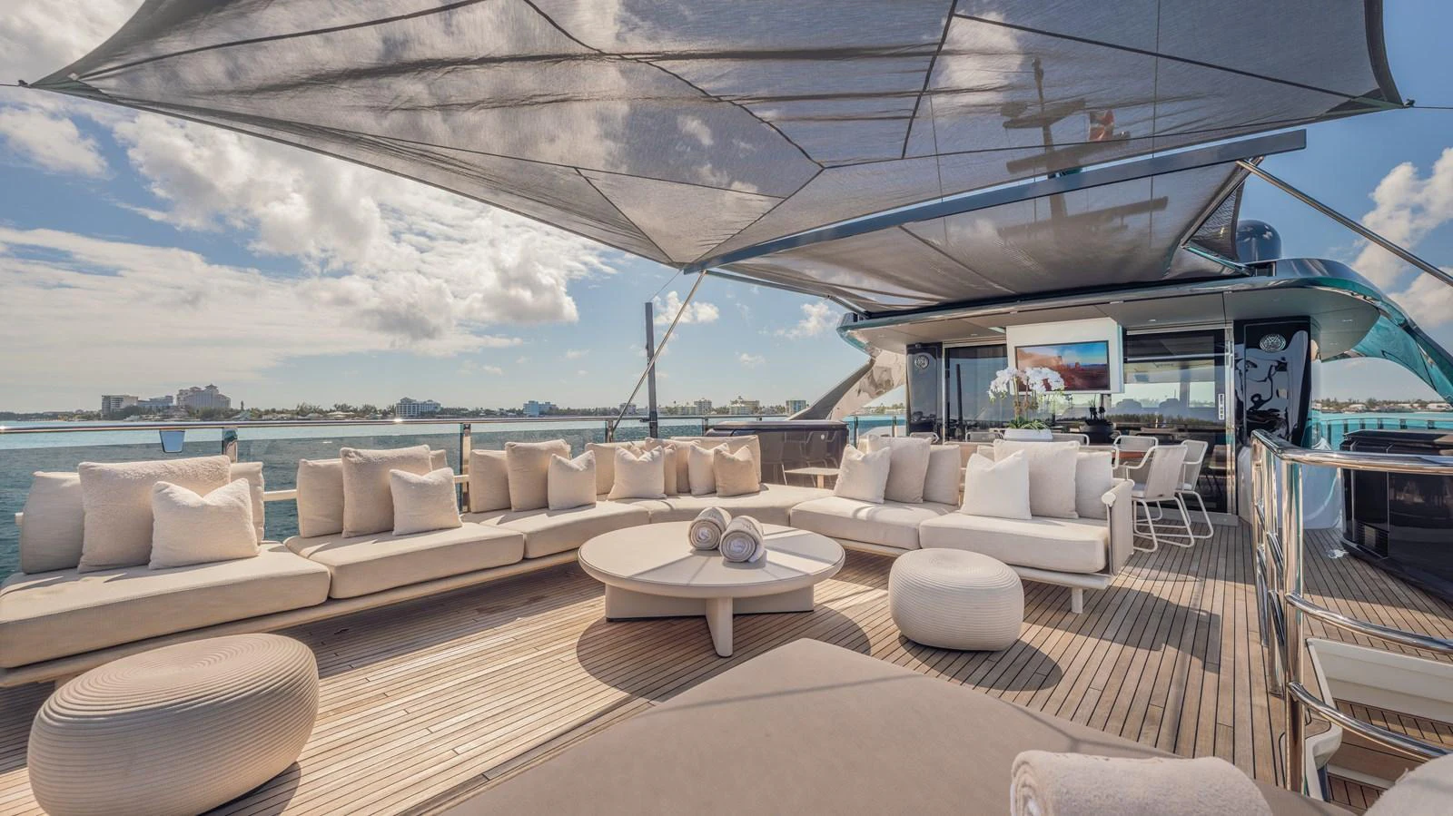 a large living room with a large patio and a large pool aboard GEMINI Yacht for Sale