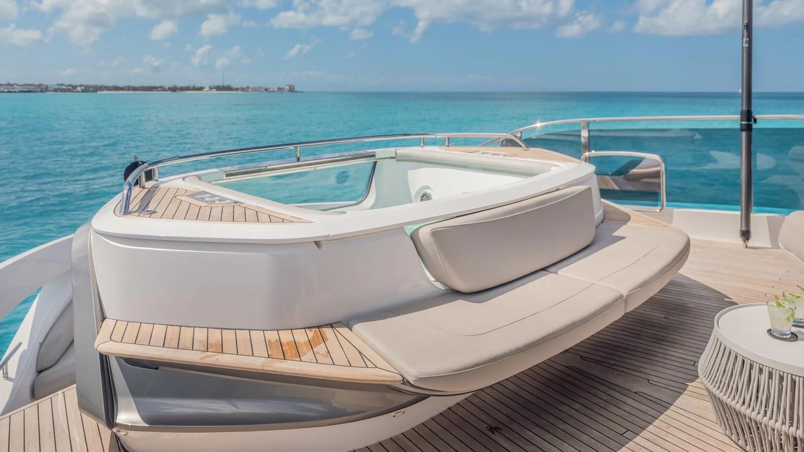 a white boat on a dock aboard GEMINI Yacht for Sale