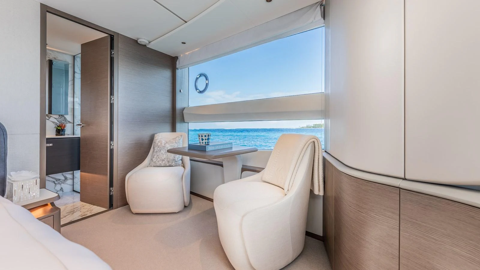 a room with a table and chairs aboard GEMINI Yacht for Sale