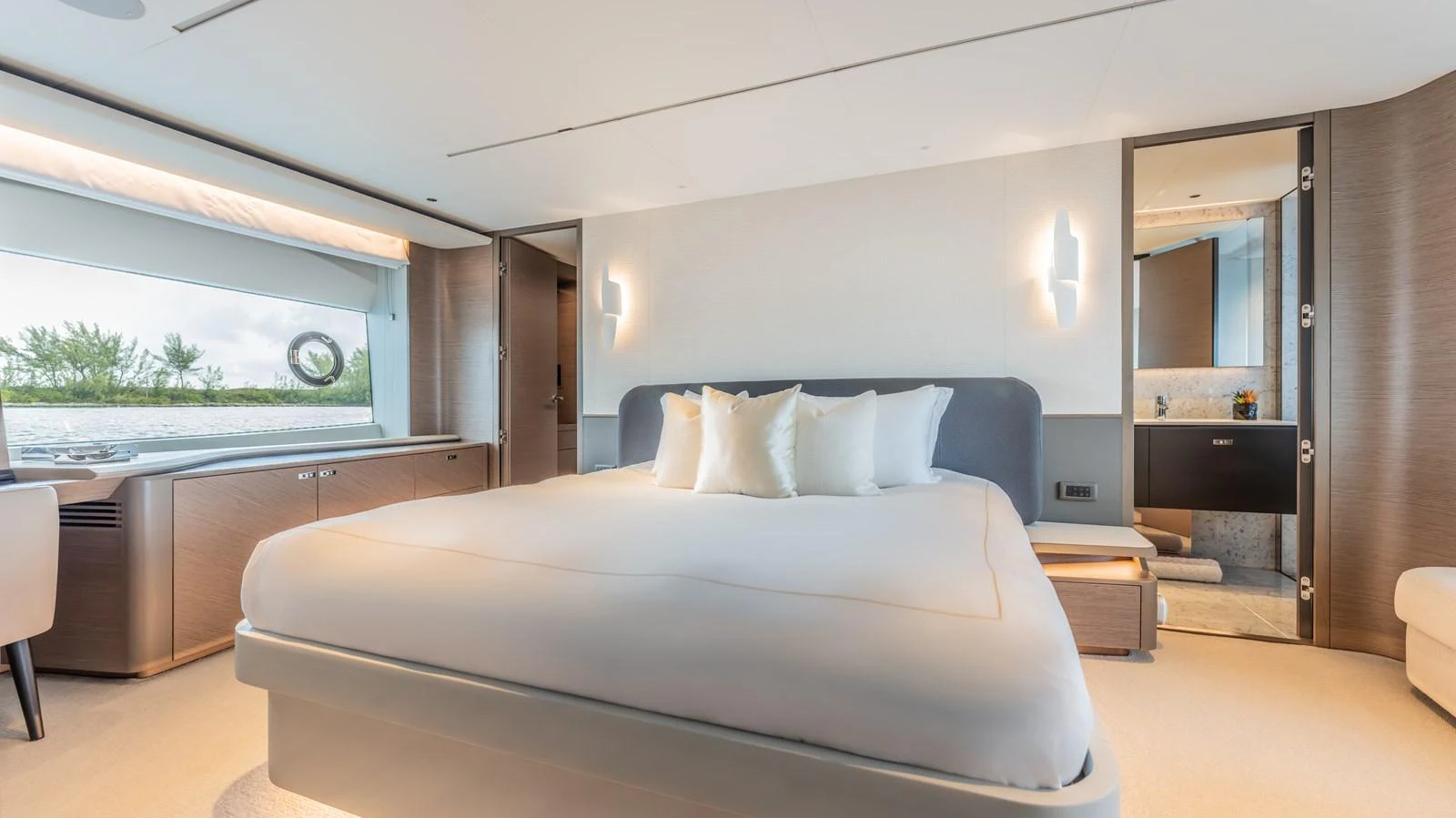 a bed in a room aboard GEMINI Yacht for Sale