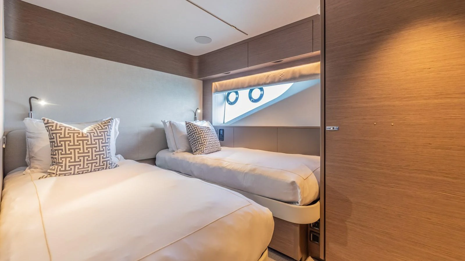 a couple of beds in a room aboard GEMINI Yacht for Sale