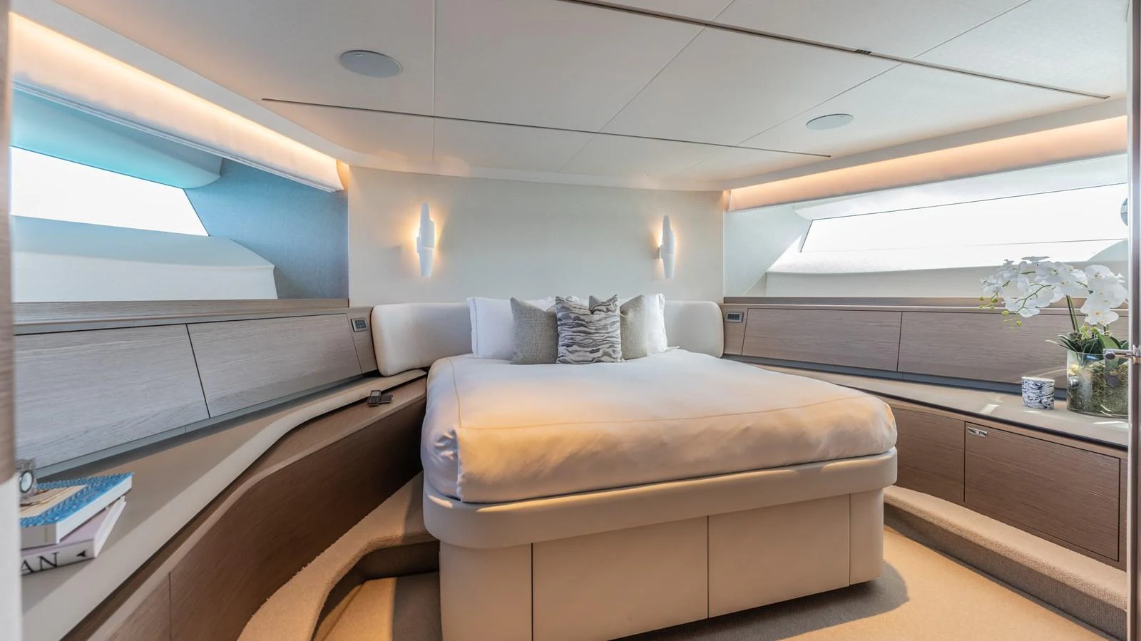 a room with a bed and a window aboard GEMINI Yacht for Sale