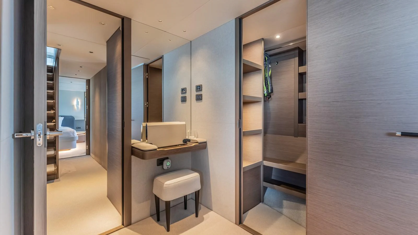 a room with a desk and a mirror aboard GEMINI Yacht for Sale