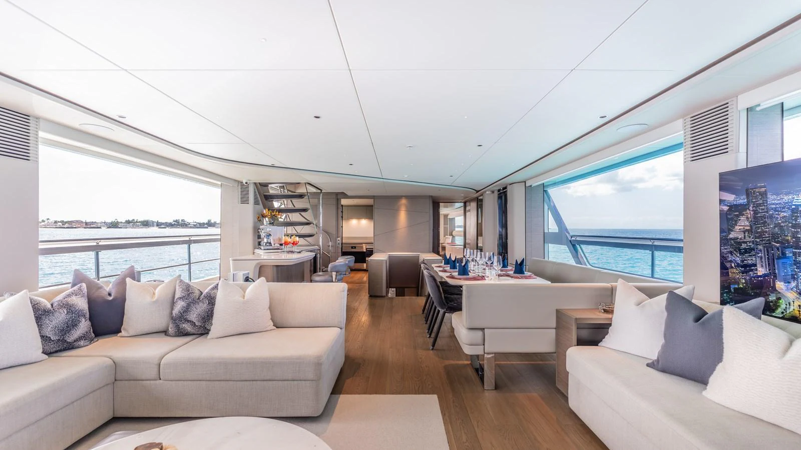 a living room with a large window aboard GEMINI Yacht for Sale