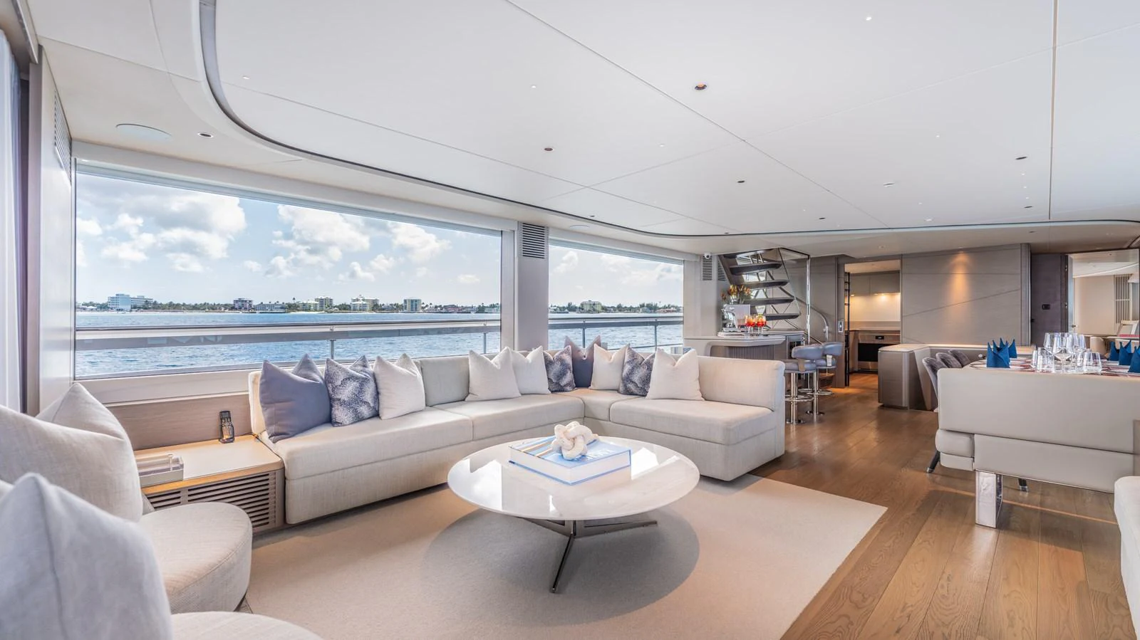 a living room with a large window aboard GEMINI Yacht for Sale