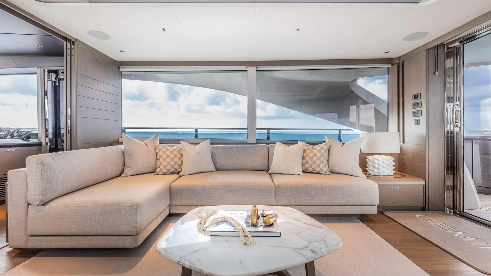 a living room with a large window aboard GEMINI Yacht for Sale