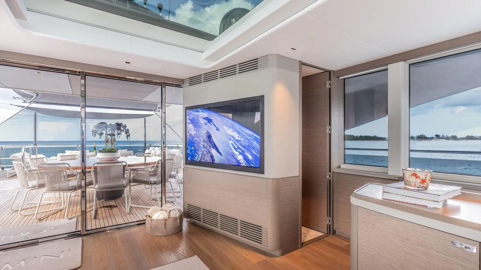 a room with a large tv aboard GEMINI Yacht for Sale