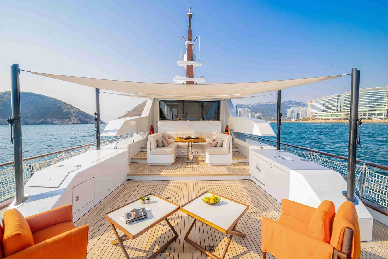 The yacht's aft deck features a spacious lounging area with comfortable seating and stunning views. aboard VERO Yacht for Sale