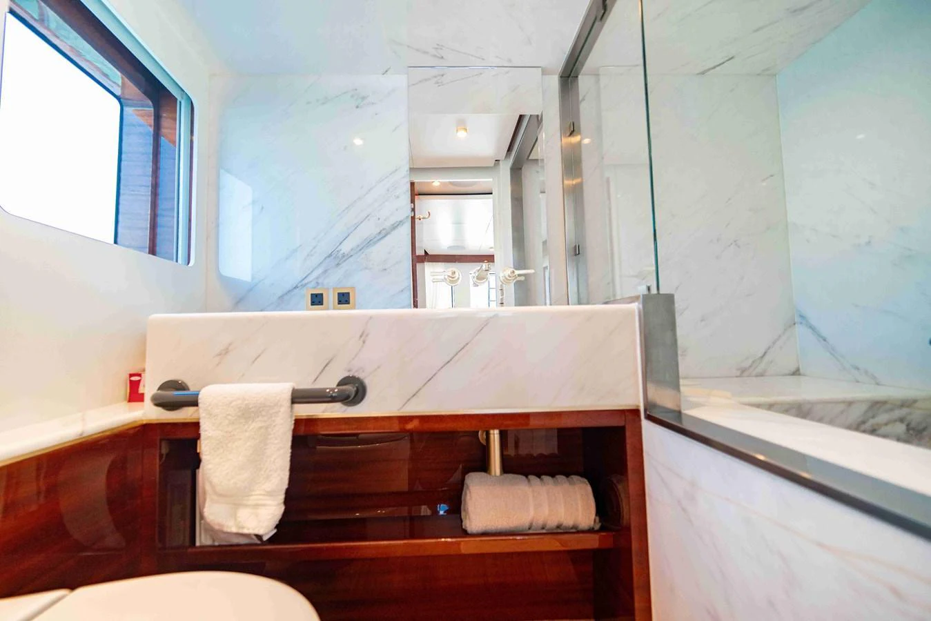 The yacht's bathroom features elegant marble surfaces and modern fixtures, creating a luxurious and serene atmosphere. aboard VERO Yacht for Sale
