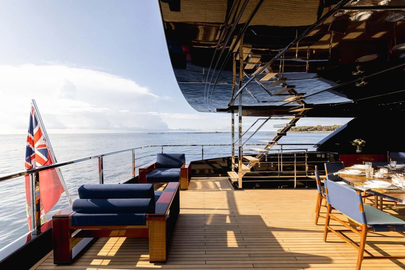 The aft deck offers a luxurious outdoor seating area with stunning ocean views. aboard LADY FIRST Yacht for Sale