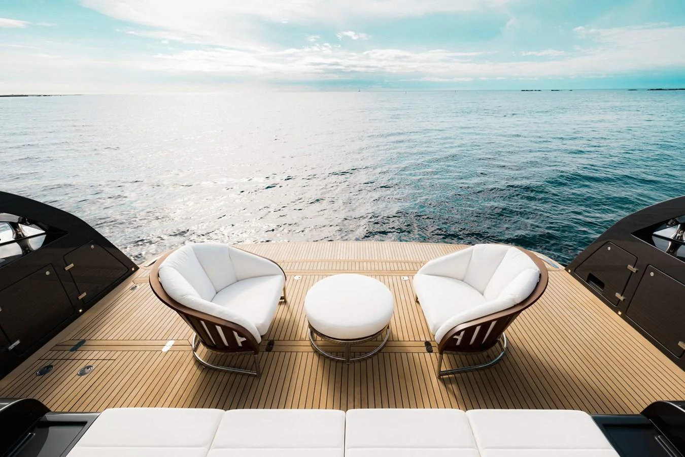 The aft deck features stylish seating with a stunning ocean view. aboard LADY FIRST Yacht for Sale