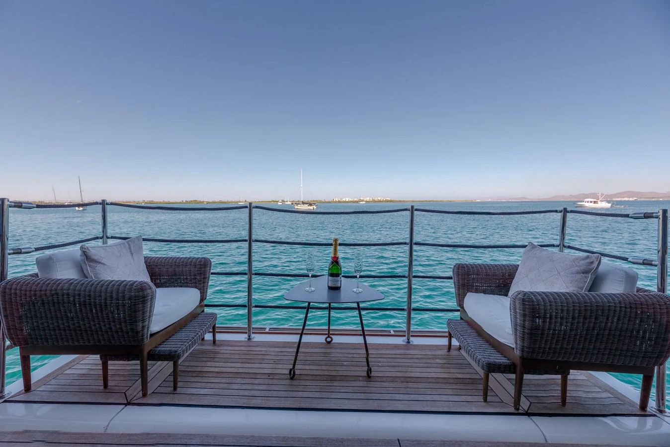 The aft deck features comfortable seating with a stunning view of the sea. aboard AMORE MIO Yacht for Sale