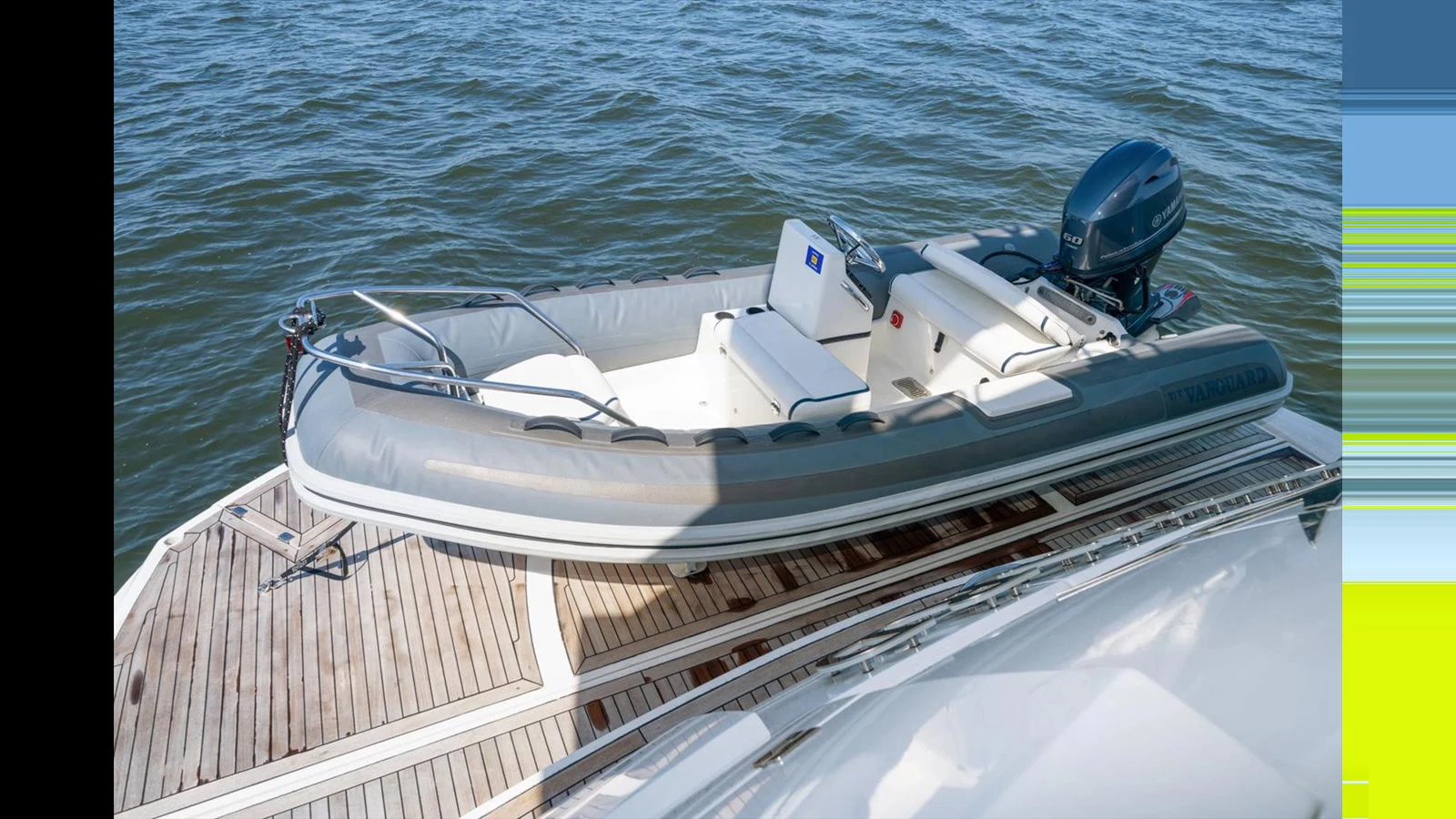 A sleek tender is securely positioned on the yacht's deck, ready for excursions. aboard VANGUARD Yacht for Sale
