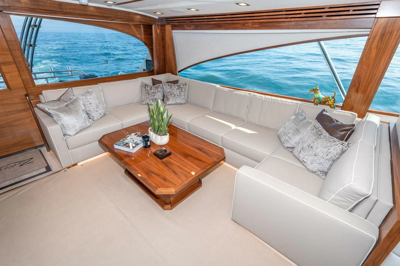 a room with a couch and a table aboard ZATARA Yacht for Sale