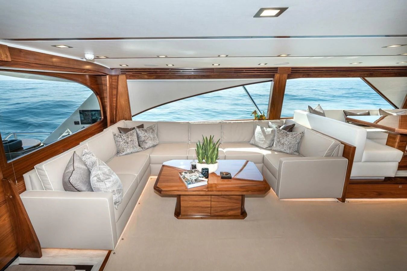 a living room with a large window aboard ZATARA Yacht for Sale