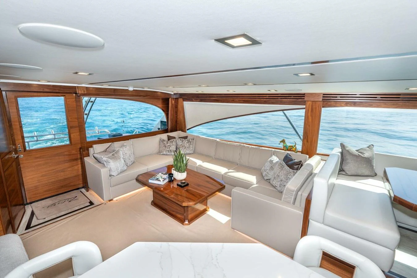 a living room with a large window aboard ZATARA Yacht for Sale