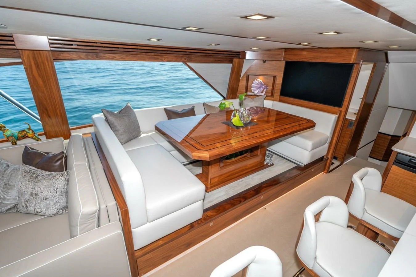 a living room with a large television aboard ZATARA Yacht for Sale
