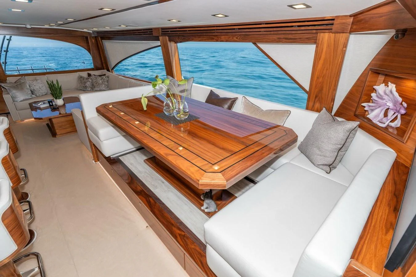 a room with a couch and a table and chairs aboard ZATARA Yacht for Sale