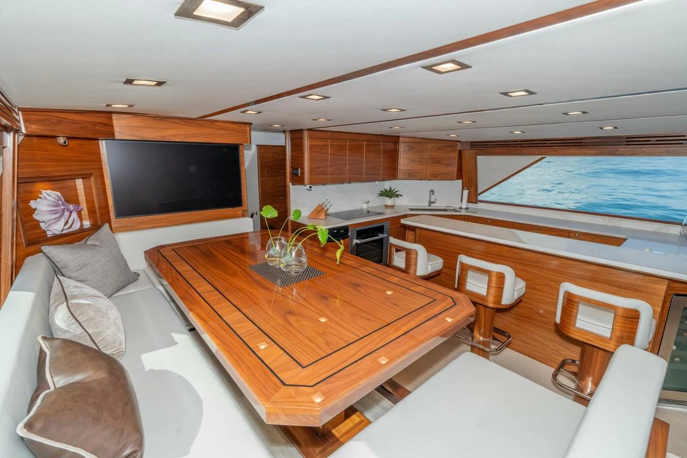 a room with a couch and a television aboard ZATARA Yacht for Sale