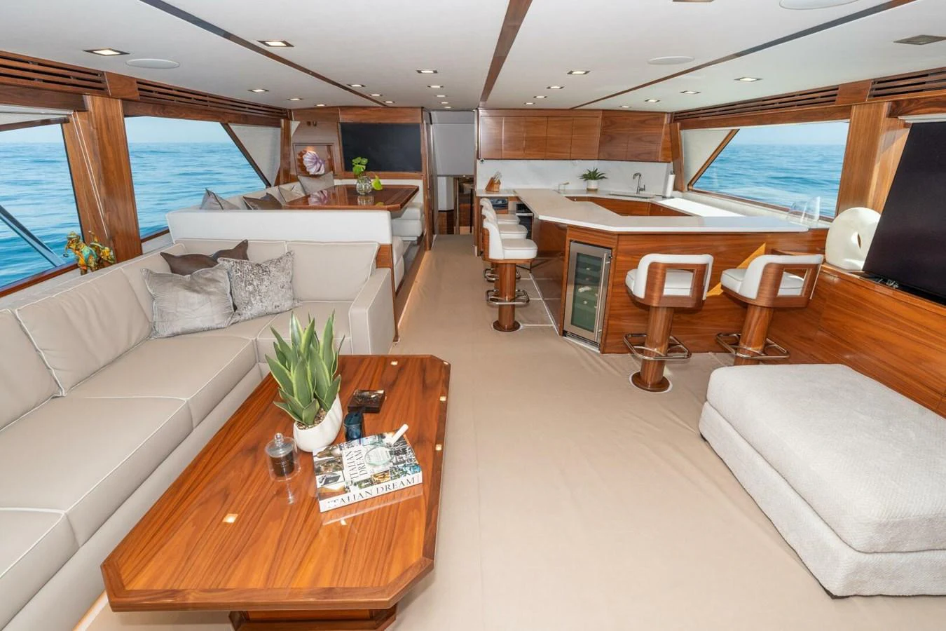 a living room with a couch and a table aboard ZATARA Yacht for Sale
