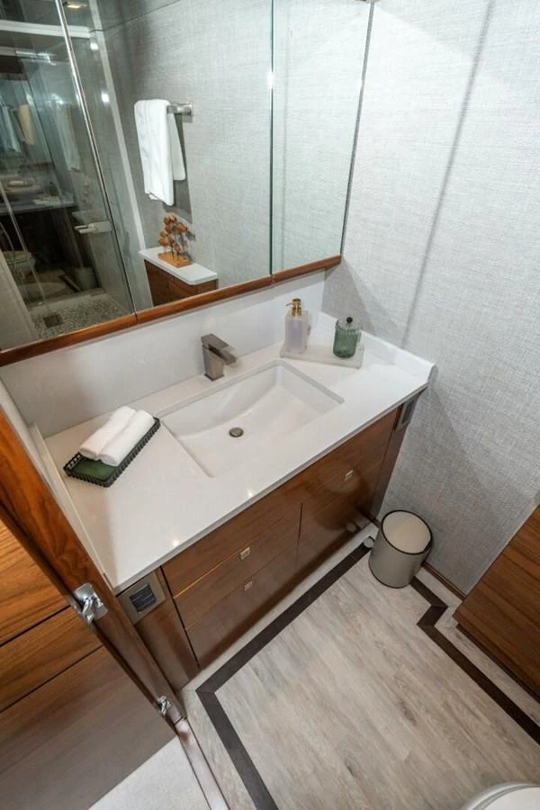 a bathroom with a large mirror aboard ZATARA Yacht for Sale