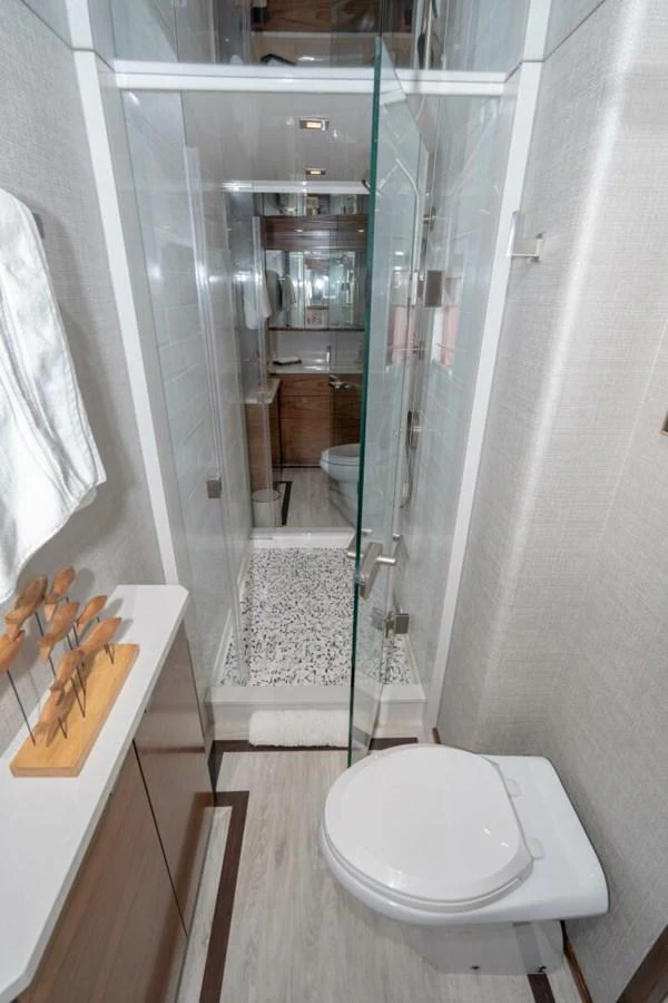 a bathroom with a glass shower aboard ZATARA Yacht for Sale