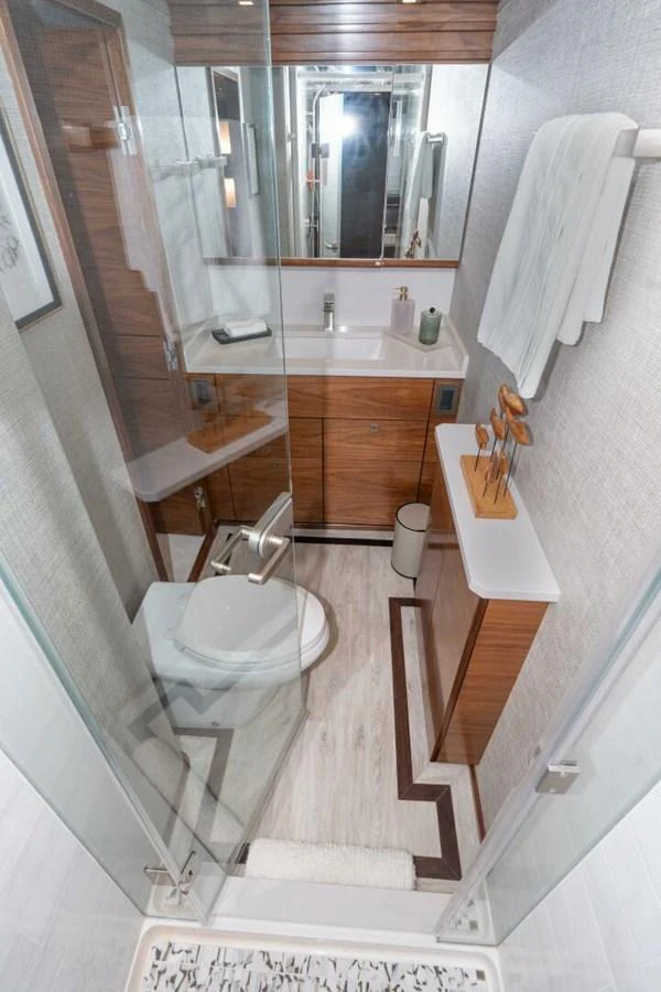 a bathroom with a toilet and a sink aboard ZATARA Yacht for Sale
