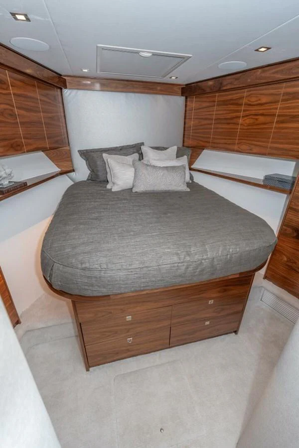 a bed with a couple of beds aboard ZATARA Yacht for Sale