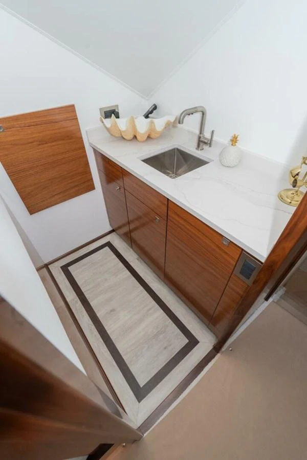 a bathroom with a sink and a mirror aboard ZATARA Yacht for Sale