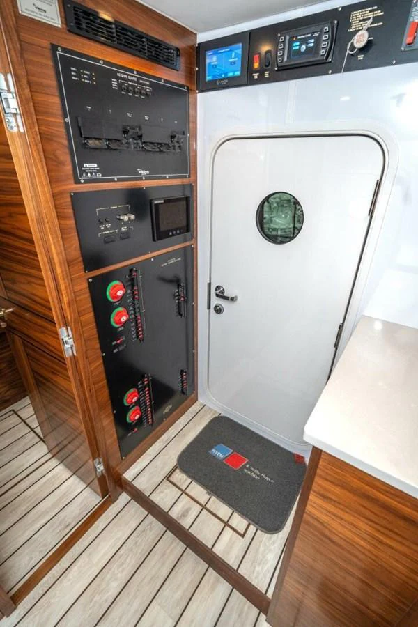 a room with a machine and a wood floor aboard ZATARA Yacht for Sale