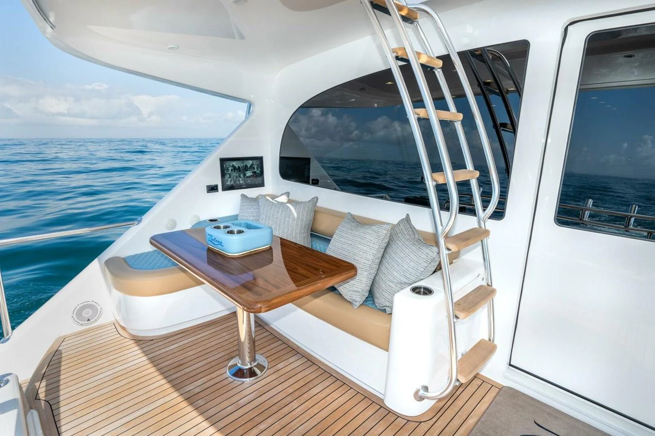 a boat with a table and chairs aboard ZATARA Yacht for Sale