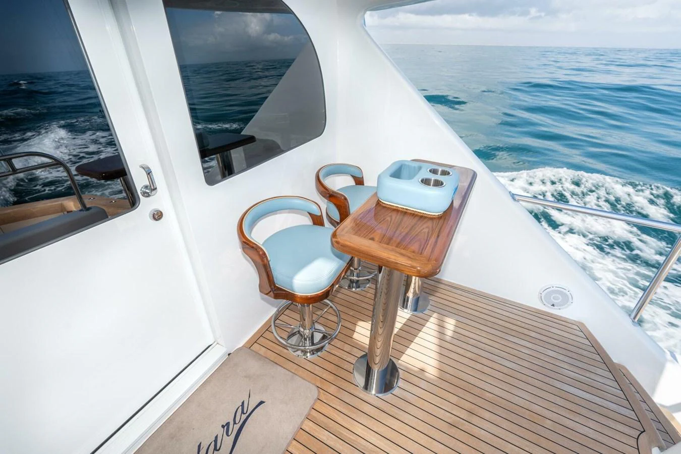 a boat with a seat on the deck aboard ZATARA Yacht for Sale
