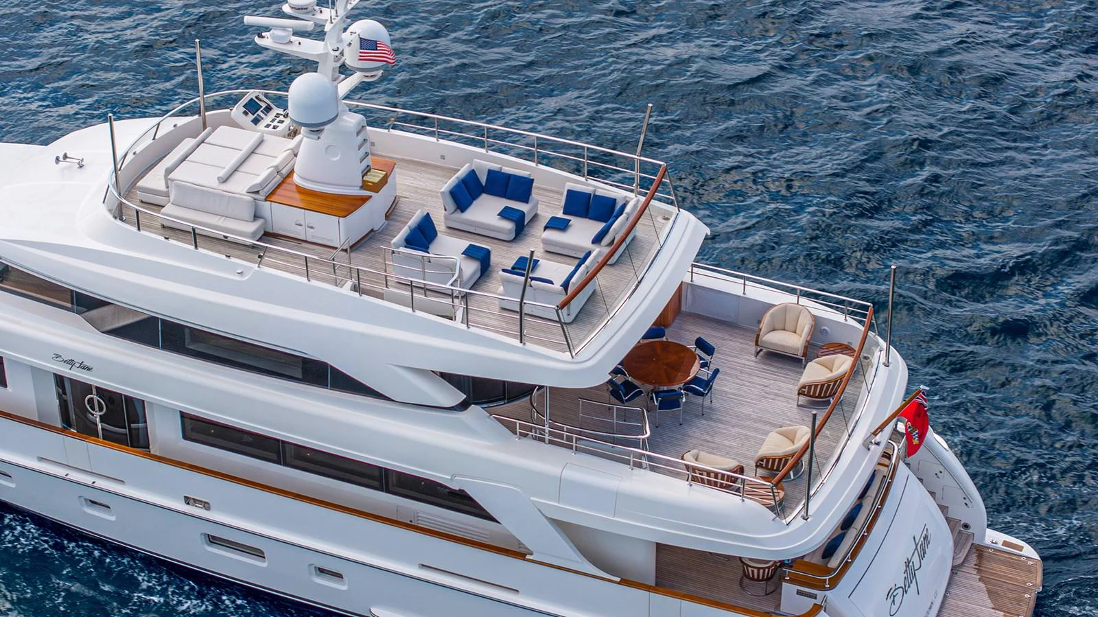 The yacht's flybridge offers ample seating and lounging areas with stunning ocean views. aboard BETTY JANE Yacht for Sale