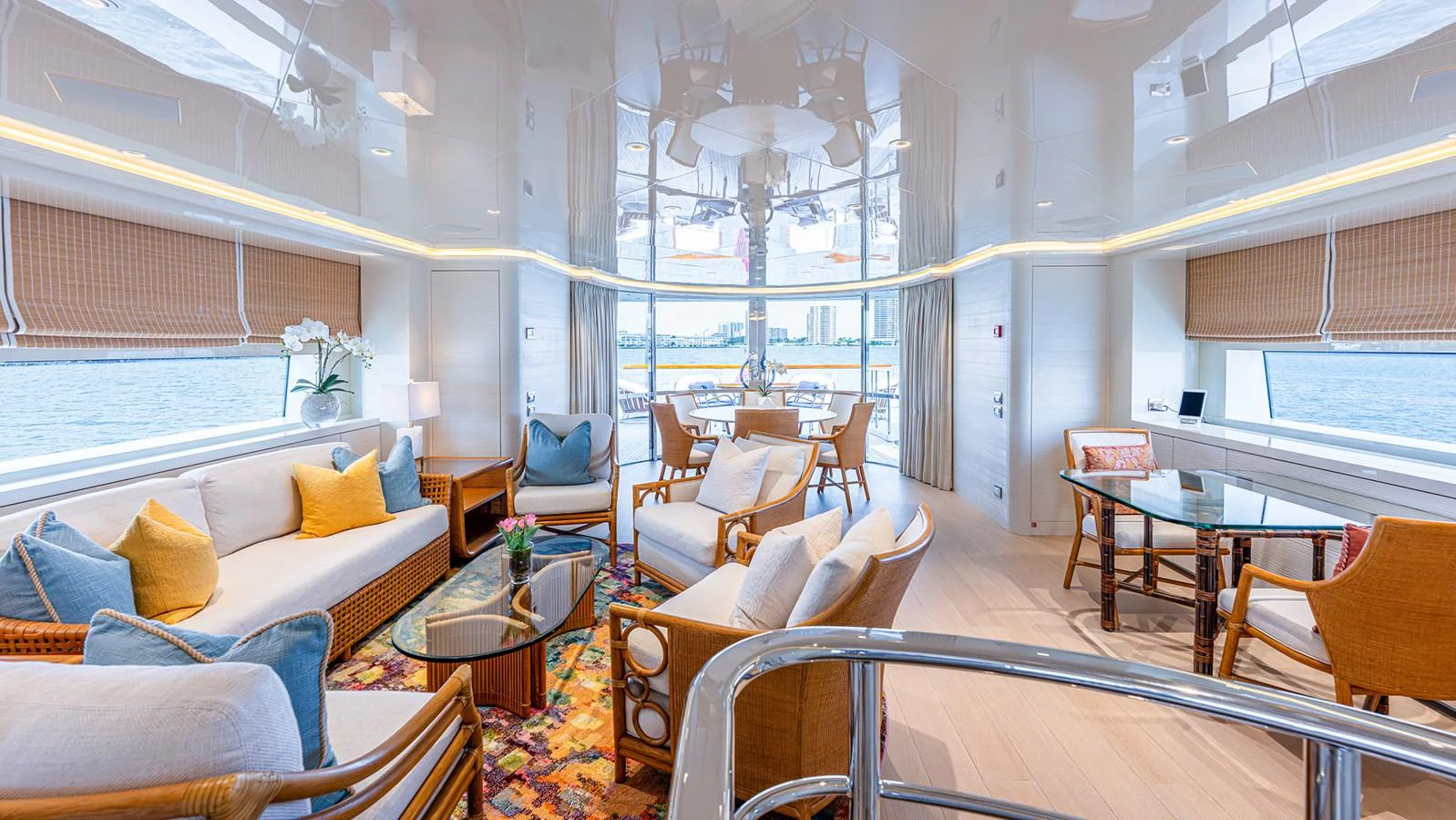 The salon offers a spacious and elegantly furnished area with panoramic views and ample seating. aboard BETTY JANE Yacht for Sale