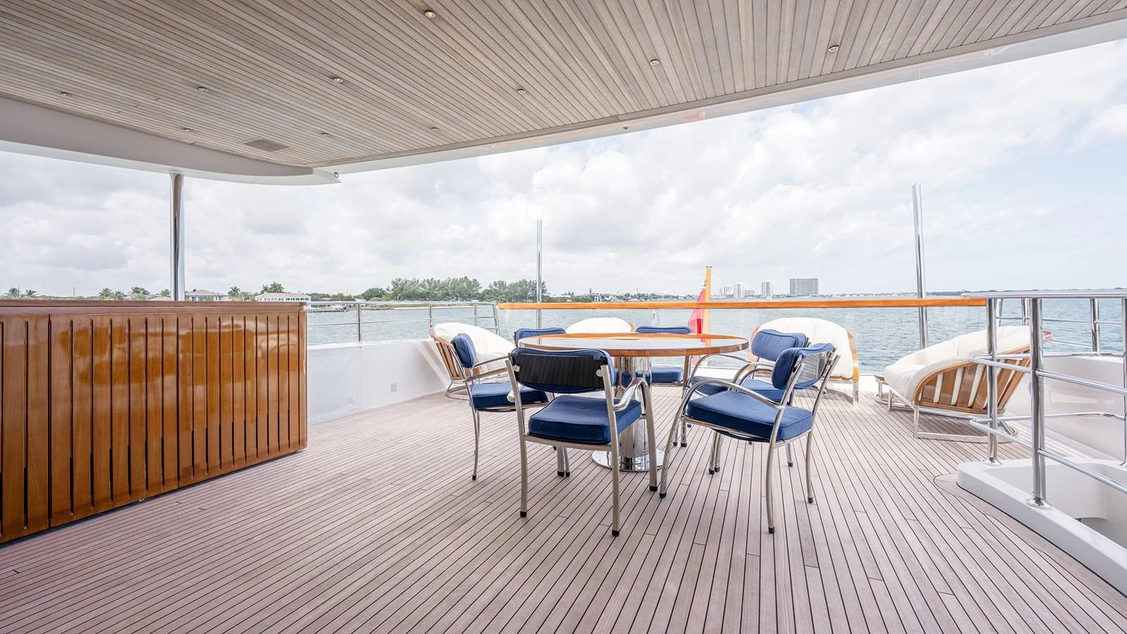 The aft deck offers a spacious and inviting area with comfortable seating and a beautiful view of the water. aboard BETTY JANE Yacht for Sale