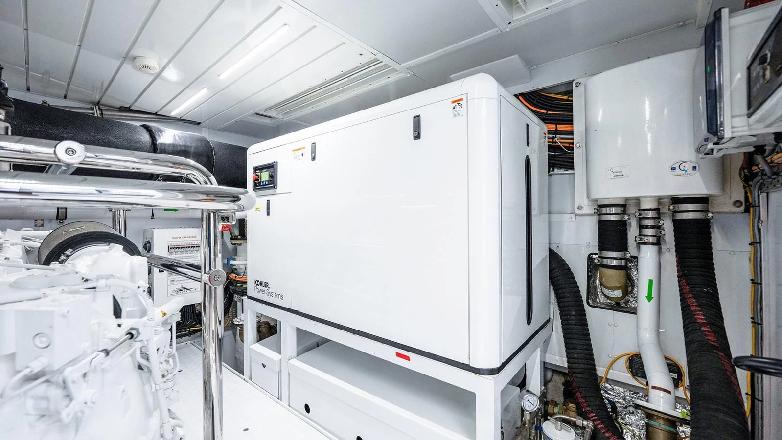 The image showcases the clean and well-organized engine room of the yacht, highlighting its advanced machinery. aboard BETTY JANE Yacht for Sale