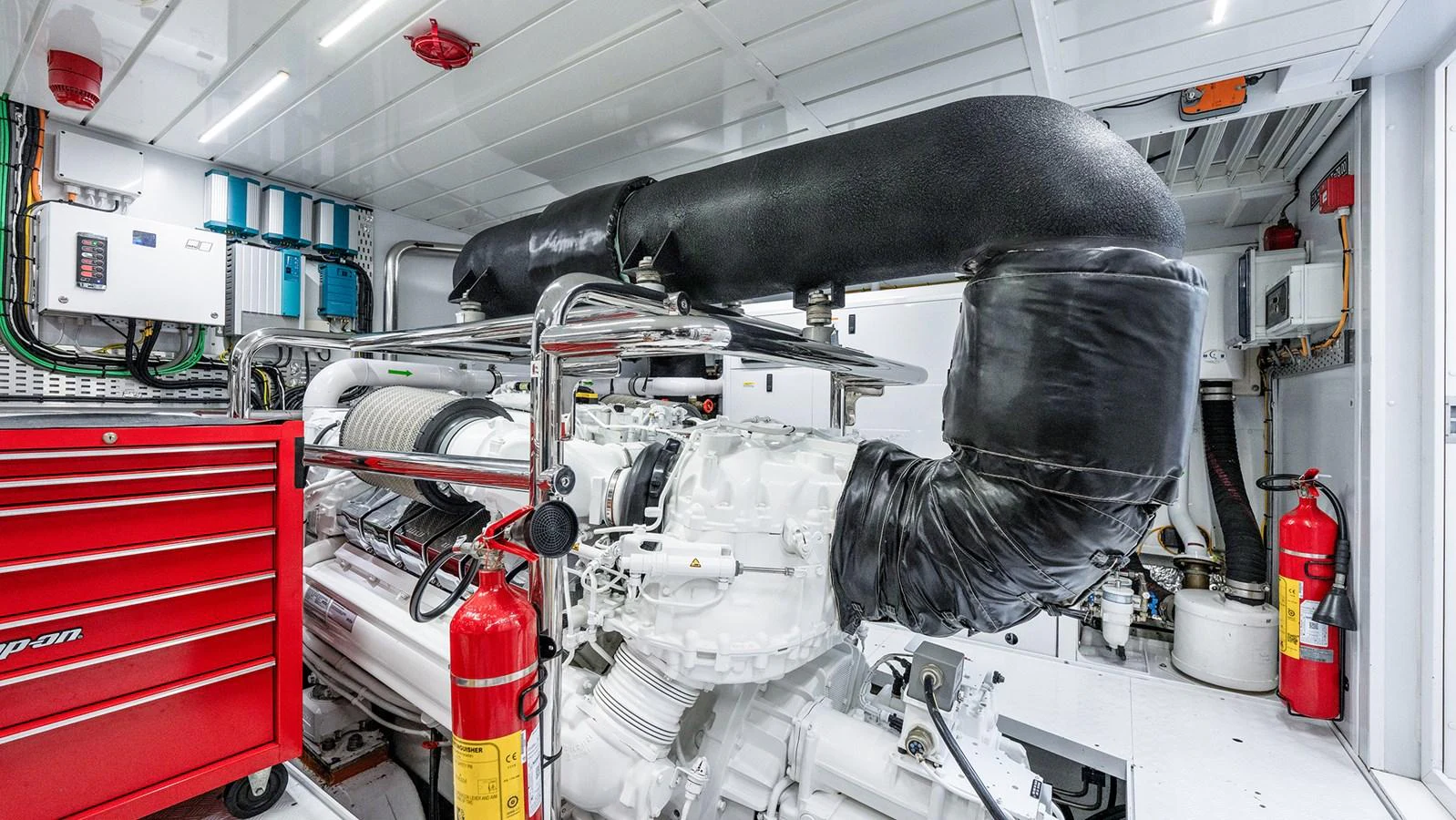 The image showcases the yacht's well-maintained engine room with advanced machinery and safety equipment. aboard BETTY JANE Yacht for Sale