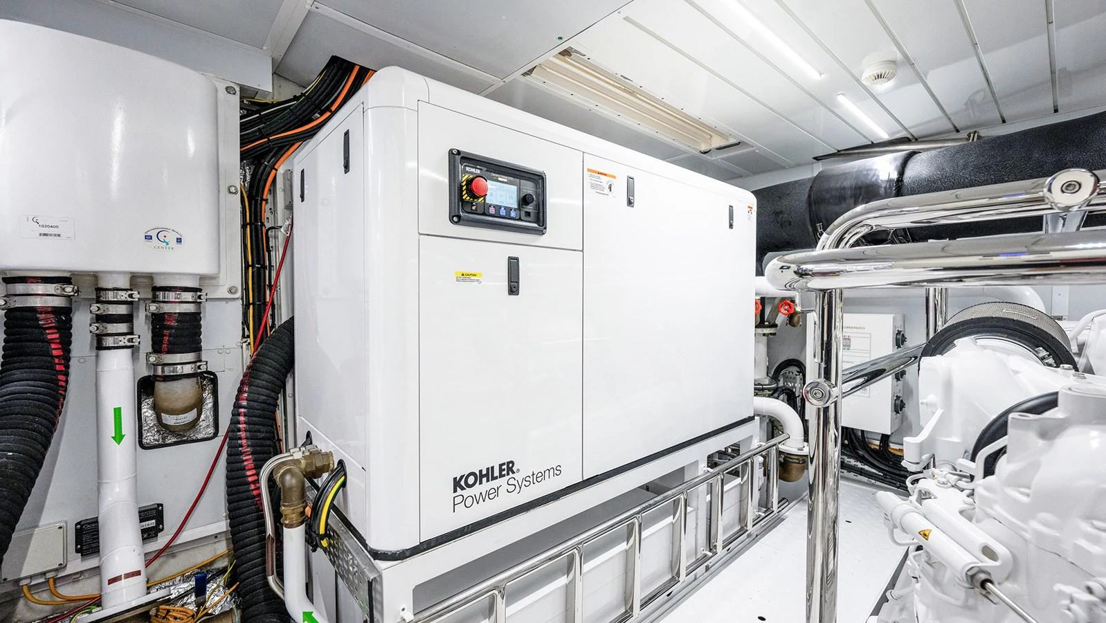 The engine room is equipped with advanced Kohler power systems, ensuring reliable performance. aboard BETTY JANE Yacht for Sale