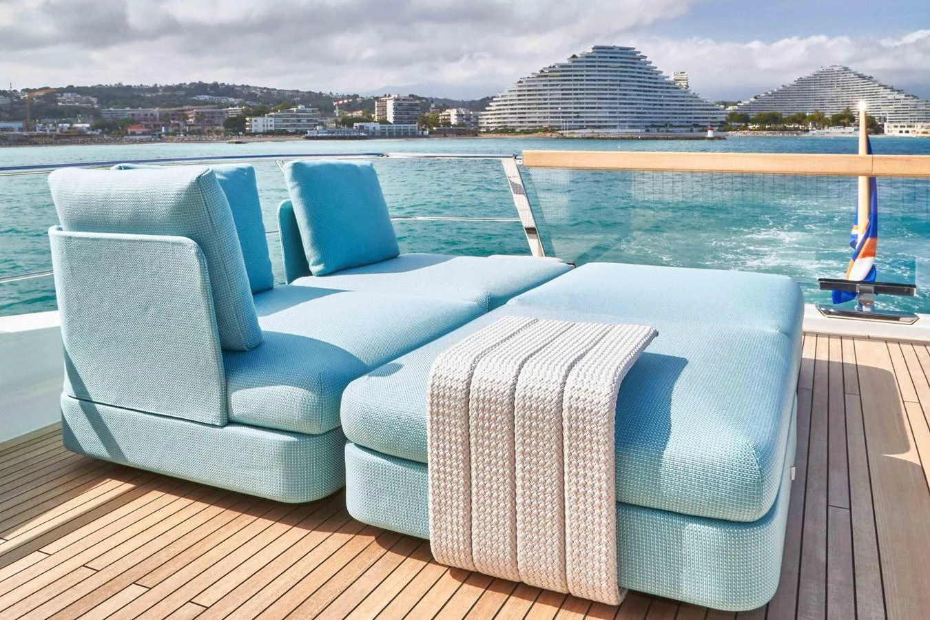 The sundeck features a luxurious lounging area with plush seating and scenic views. aboard KAPUSHA Yacht for Sale